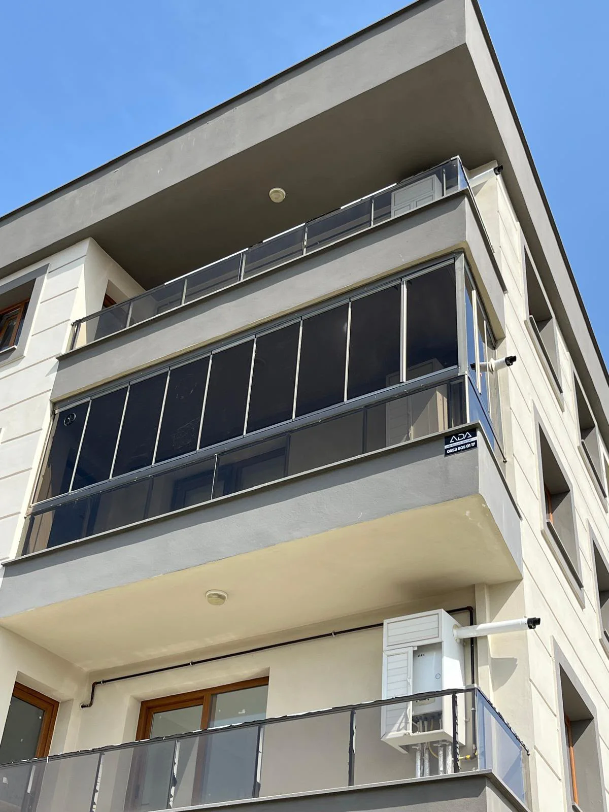 Akhisar cam balkon uygulaması – apartman balkonu kapatma – ADA Cam Balkon Sistemleri